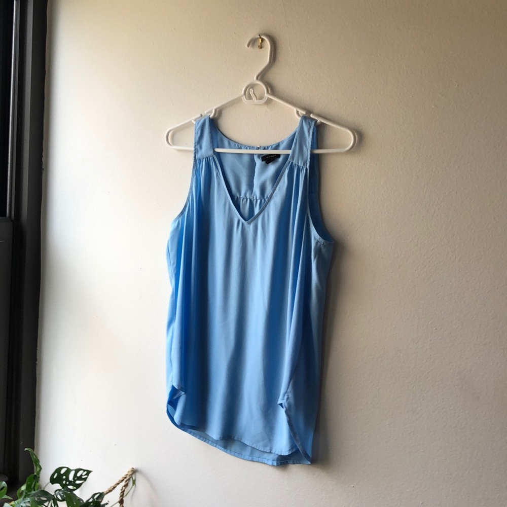 Light blue sleeveless blouse